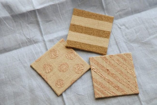 Embroidered Fabric Swatches In Warm Tones