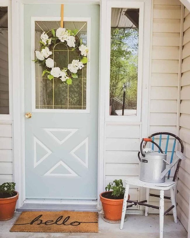 Pale Green Door With Flower Wreath