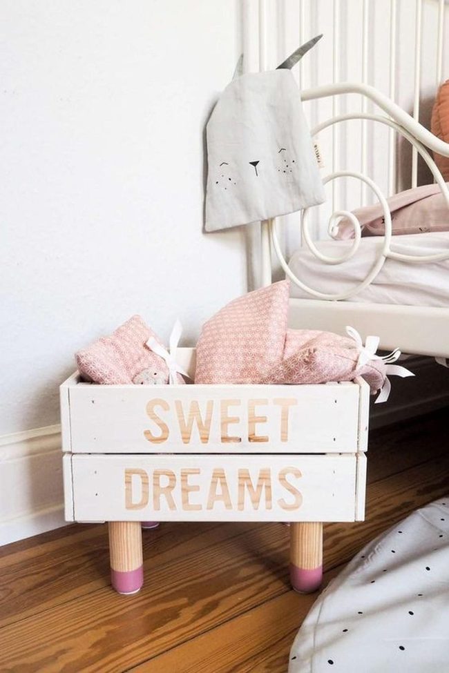 Pink Walls, Wooden Crates, Metal Bed