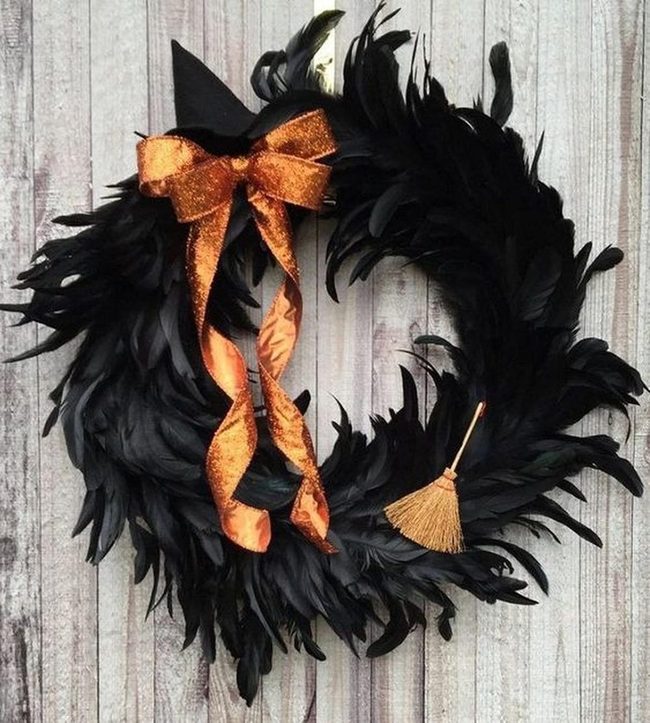 Black Feather Wreath With Orange Bow