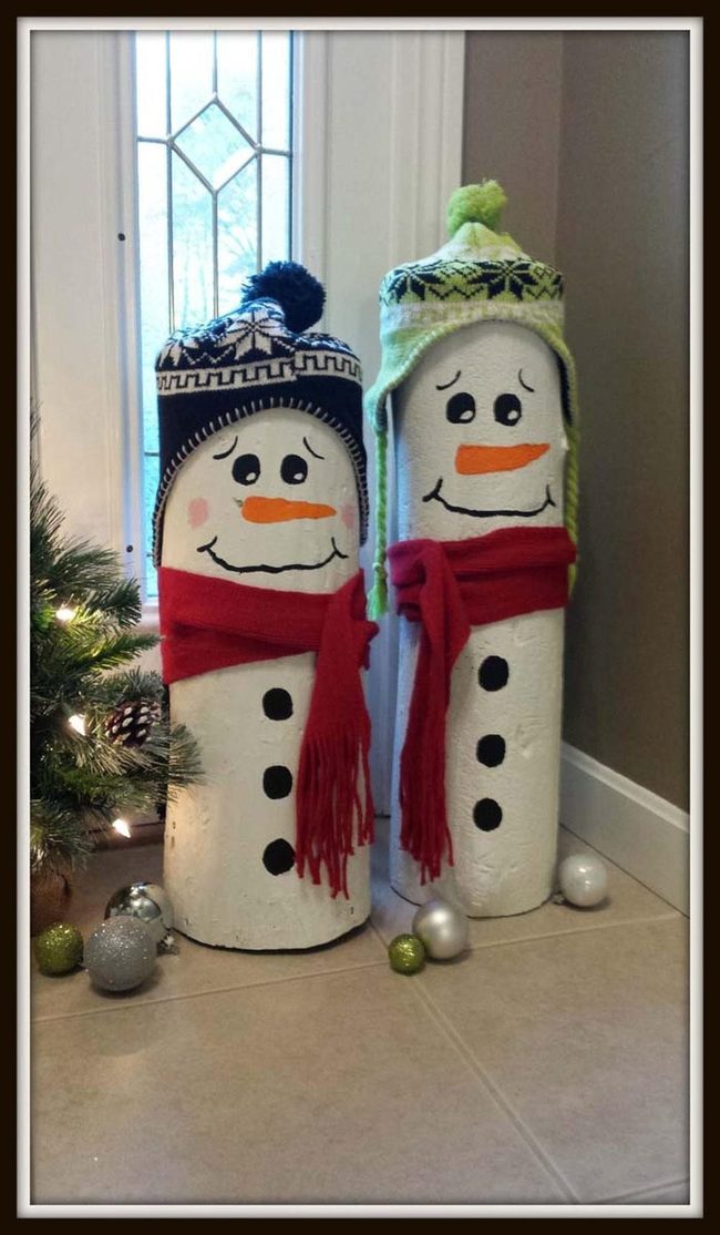 White Painted Log Snowmen