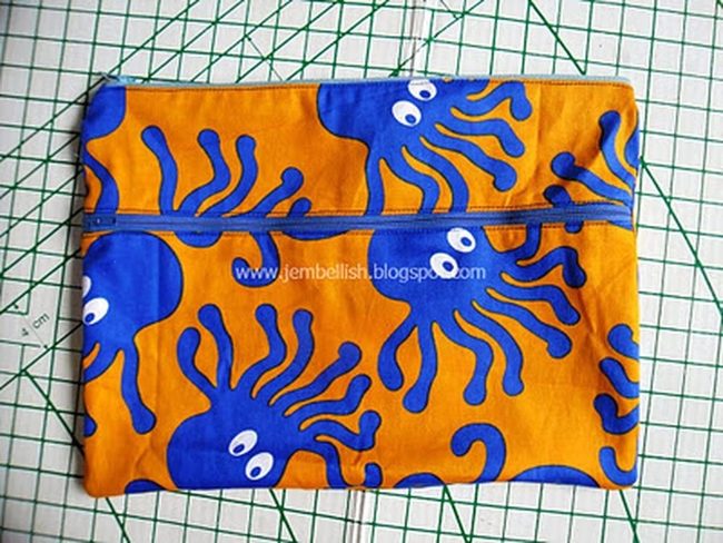 Blue Octopuses On Bright Orange