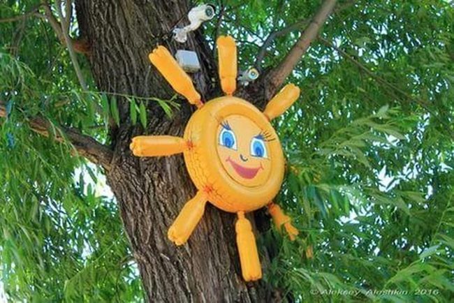 Yellow Bottle Sun From Recycled Trash