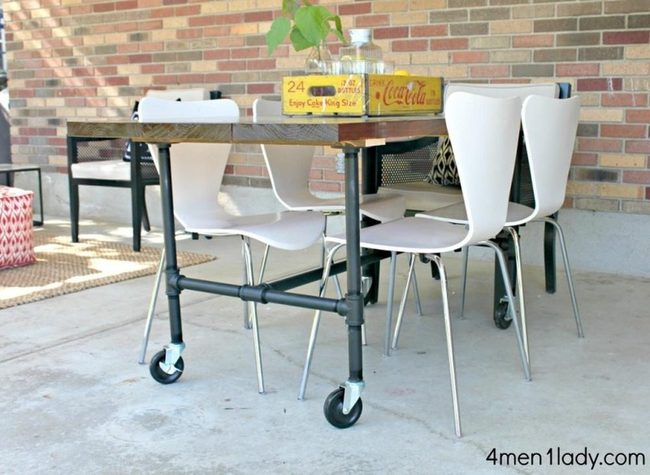 Industrial Pipe Table With White Chairs