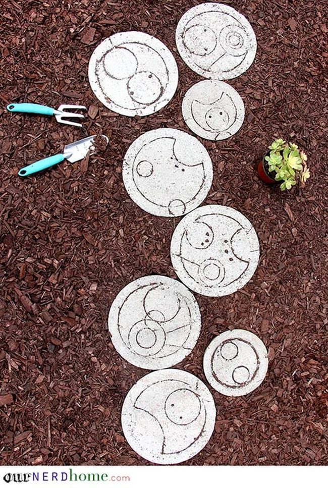 White Swirled Stepping Stones Through Brown Mulch