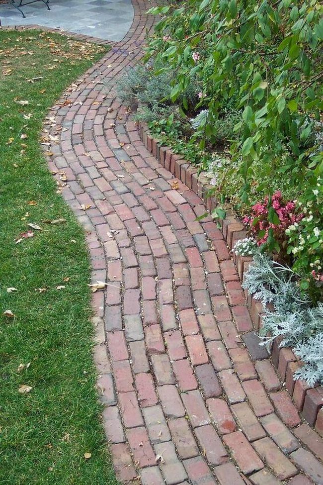 Curved Brick Path Through Blooms