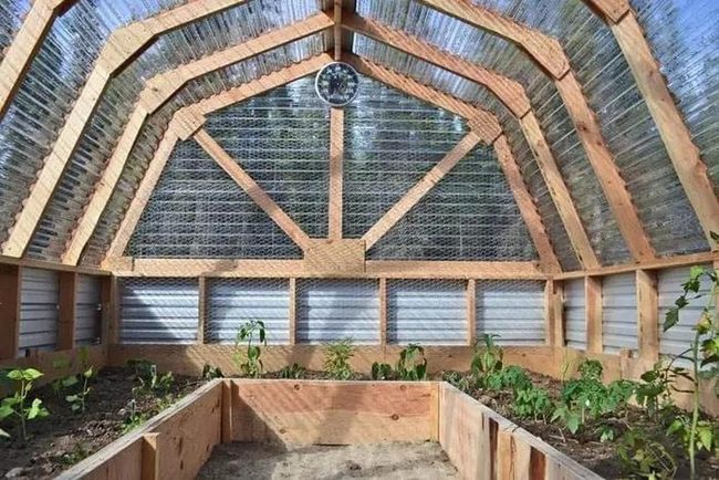 Wooden Greenhouse Adds Garden Character