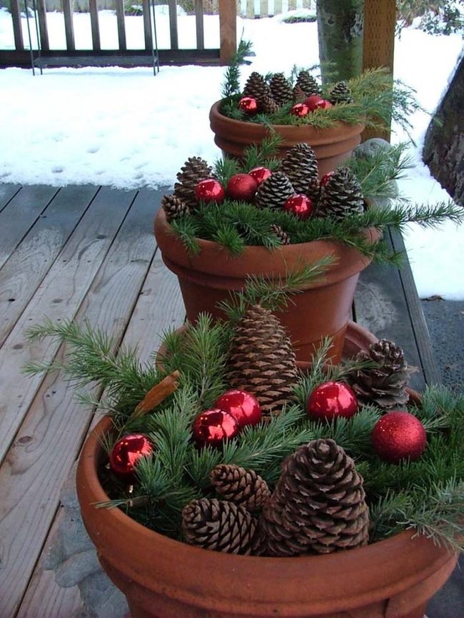Terracotta Planters Overflowing Evergreens