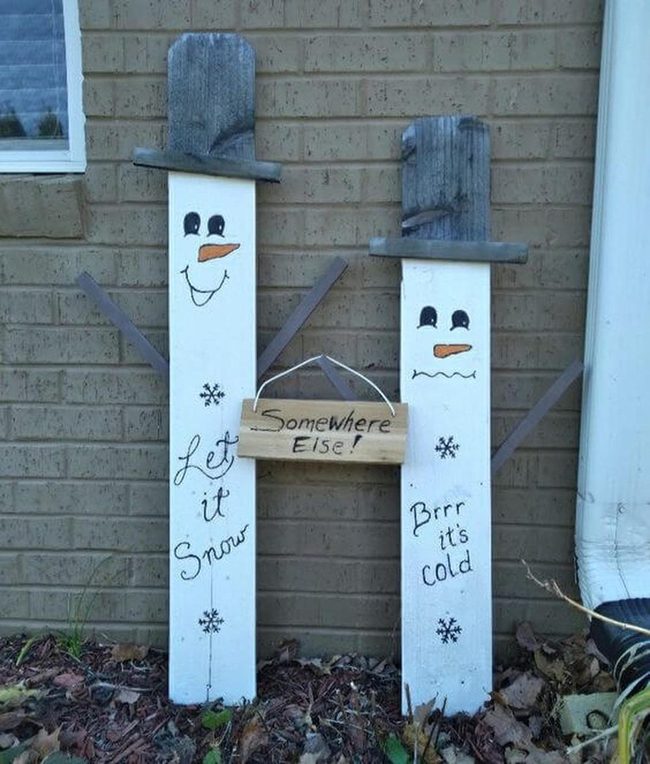 White Fence Post Snowmen