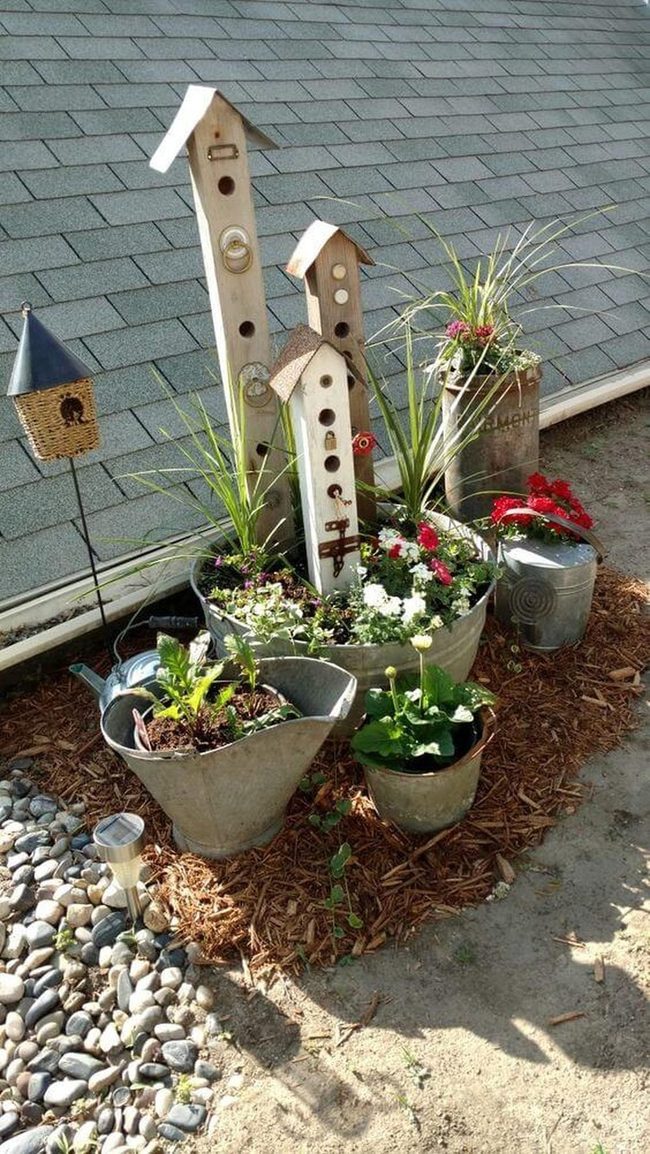 Blooming Garden Corner With Birdhouses