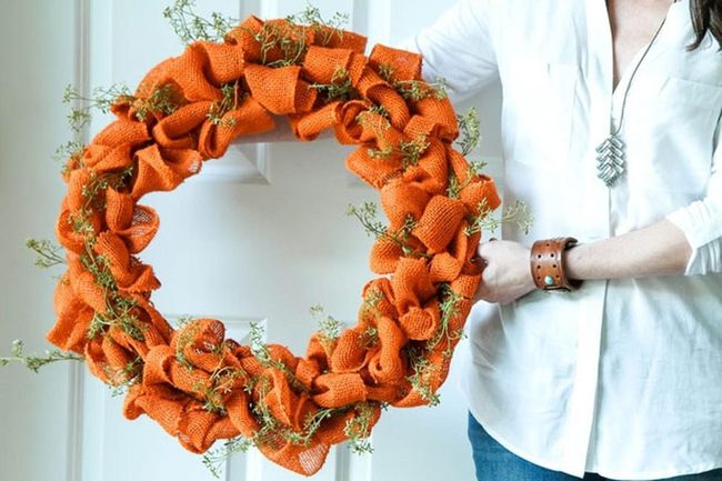 Orange Burlap Wreath With Green Twigs