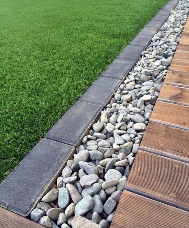 Sunlit Gray Stone With Green Grass