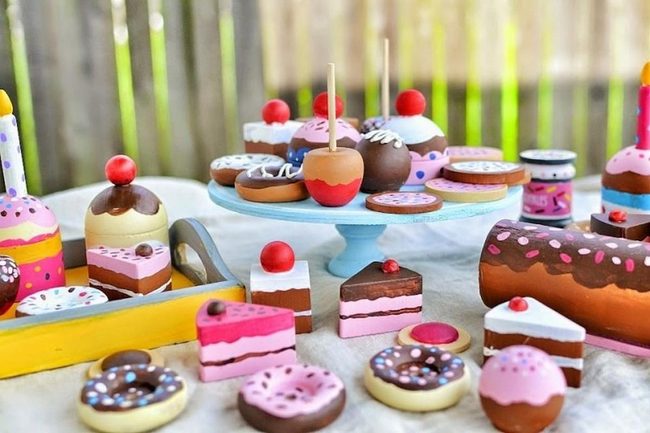 Pink Frosted Treats On Wood