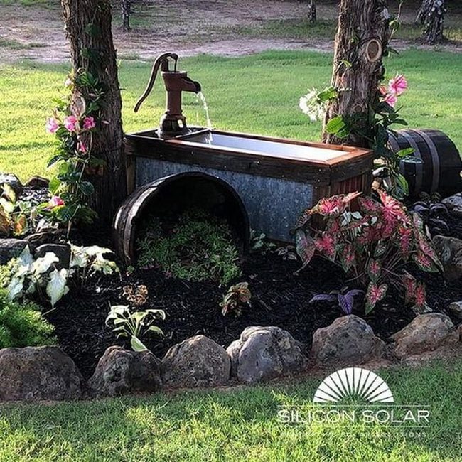 Antique Pump Garden Centerpiece