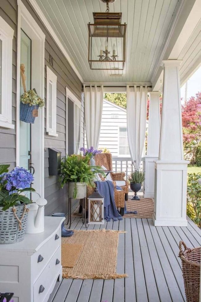 Blue Pillows Wicker Porch Oasis