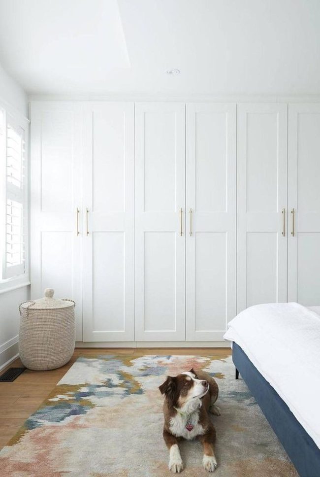 White Bedroom With Blue Accents