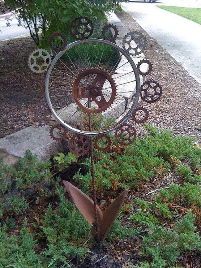Rusted Wheels Into Blooming Art