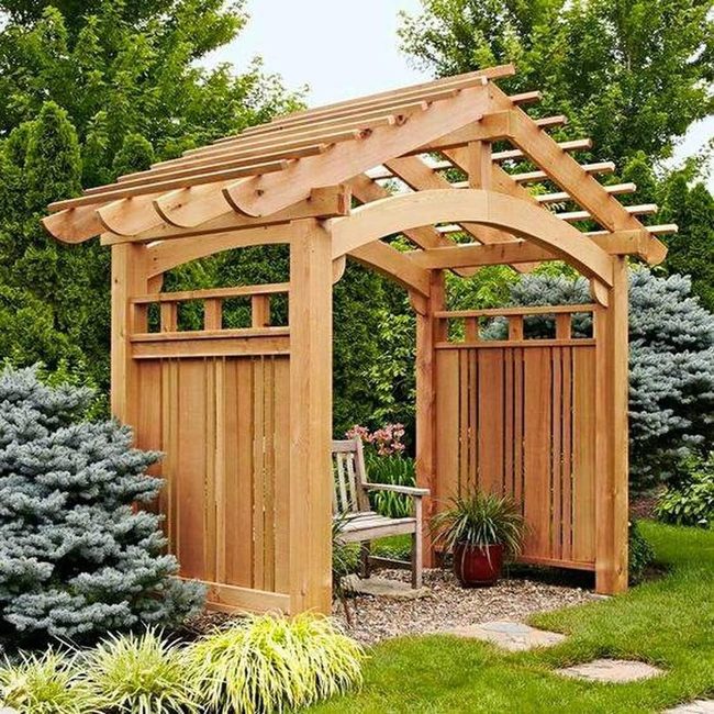 Wooden Arbor With Climbing Roses