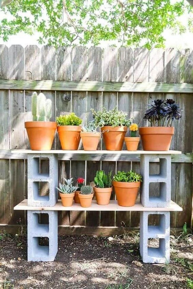 Terracotta Pots On Stacked Blocks