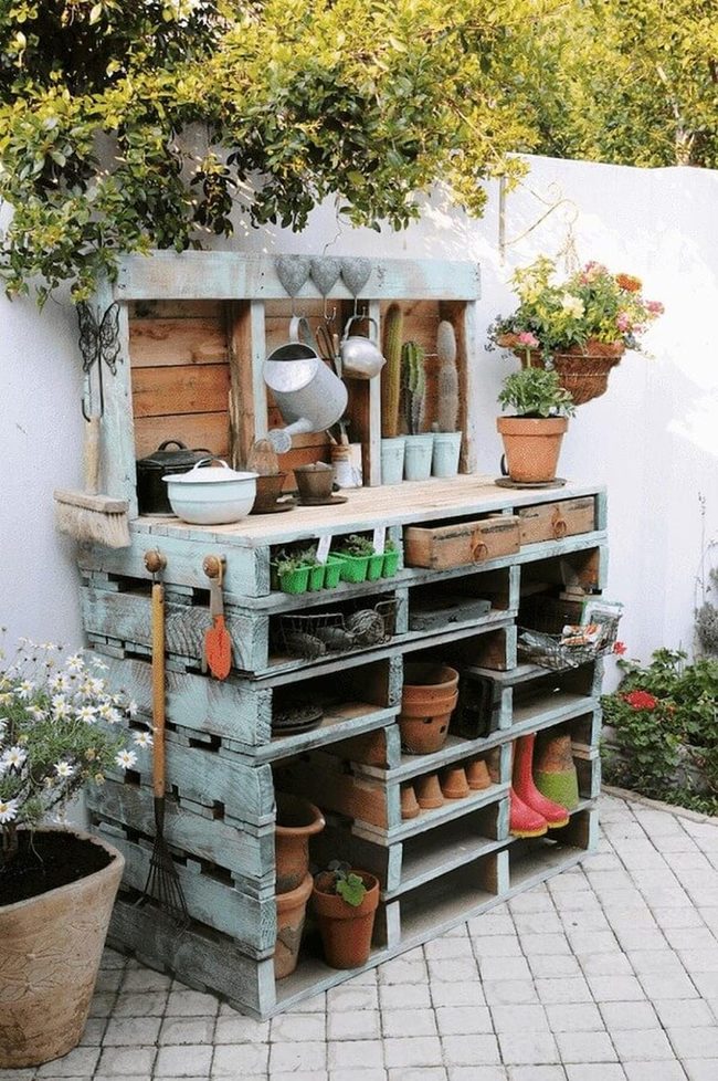 Pallet Potting Bench With Hanging Blooms