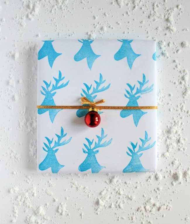 Blue Reindeer White Paper Gold Bow