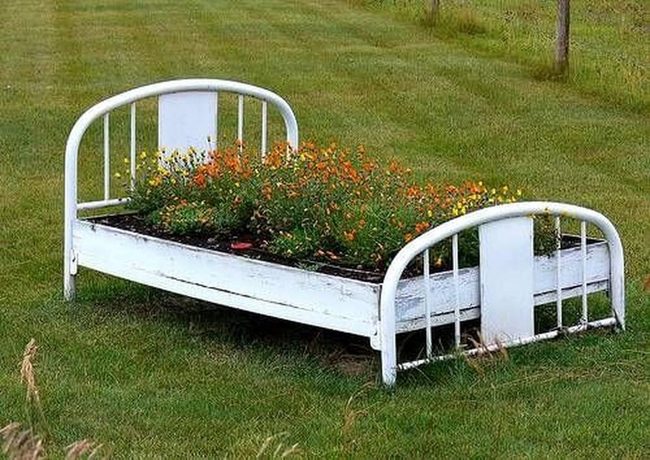White Metal Planters With Overflow Blooms