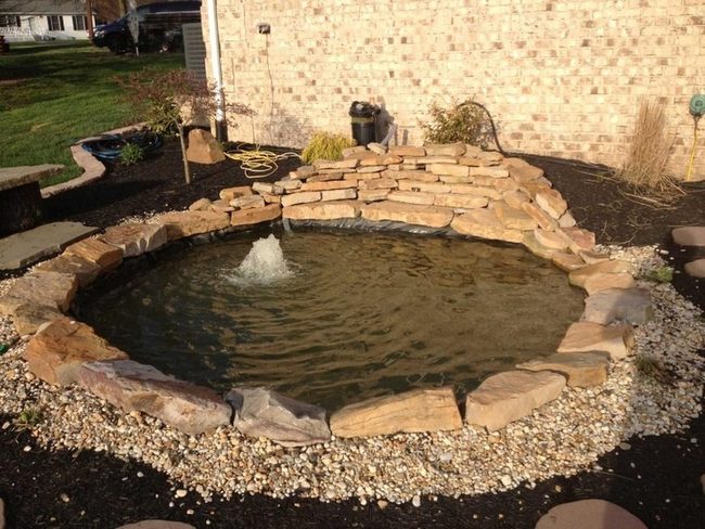 Stone Pond With Gentle Fountain