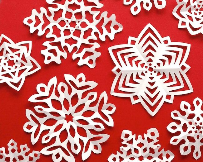 White Paper Snowflakes Red Background