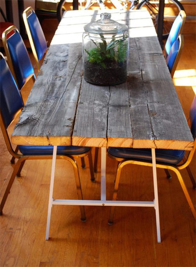 Weathered Wood Table With Blue Chairs