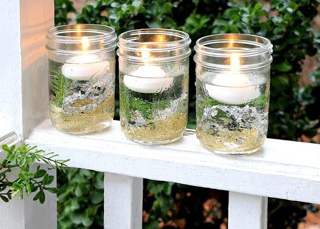 White Floating Candles With Greenery