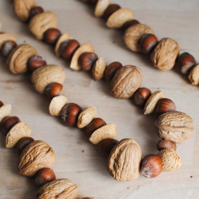 Scattered Walnuts On Natural Wood