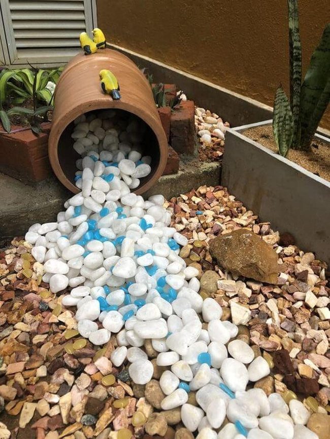 Toppled Pot White Stones Blue