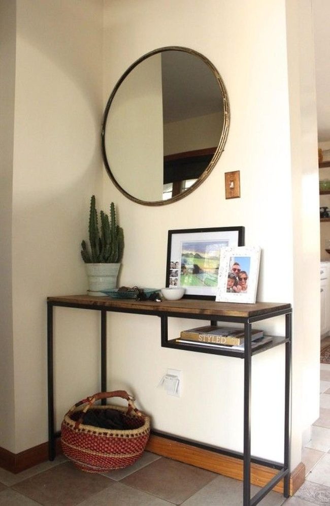 Round Mirror Brightens Compact Entryway