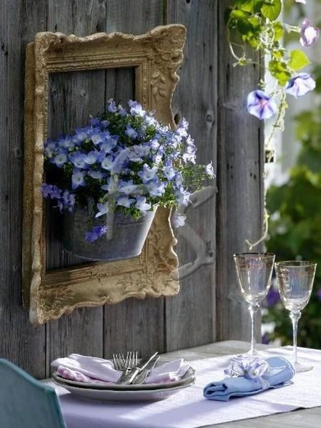 Framed Flowers On Garden Walls