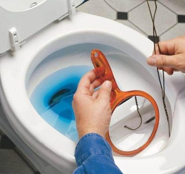 Mineral Deposits Blocking Toilet Rim