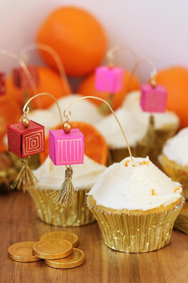 Golden Cupcakes With Frosting Clouds