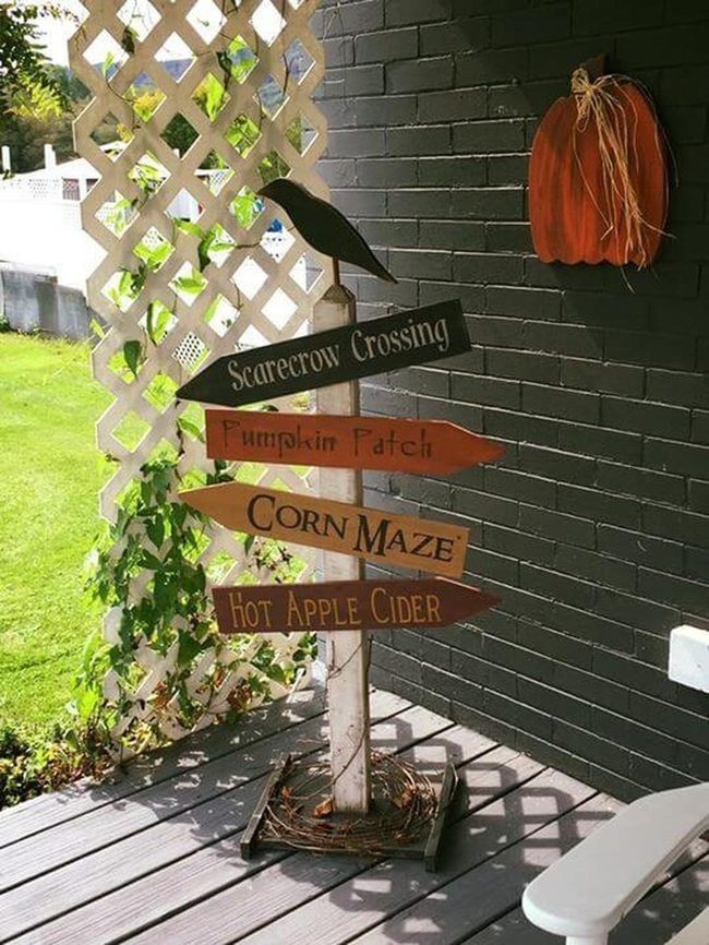 Crow-Topped Wooden Directional Signs
