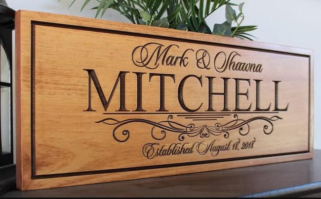 Carved Names And Date In Wood