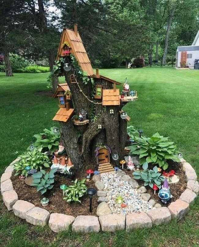 Miniature Houses Inside Glowing Stump
