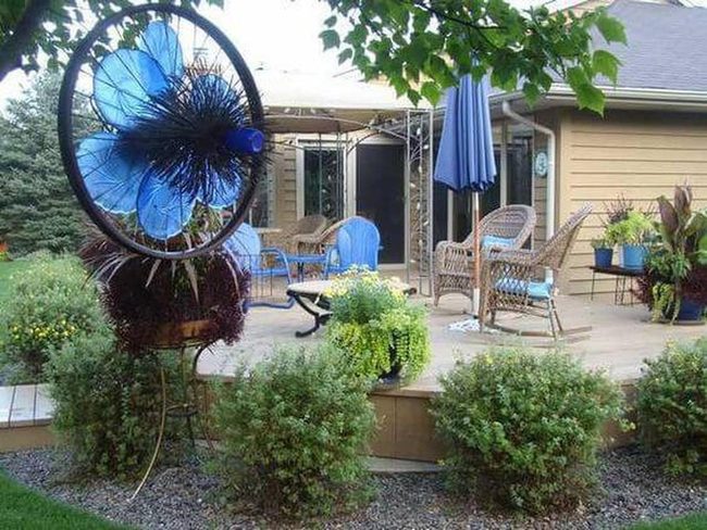 Colorful Painted Wheels Garden Art