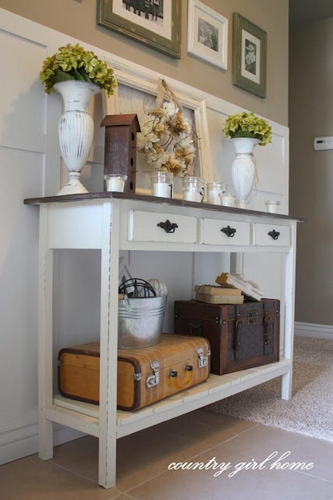 White Farmhouse Table With Green Vases