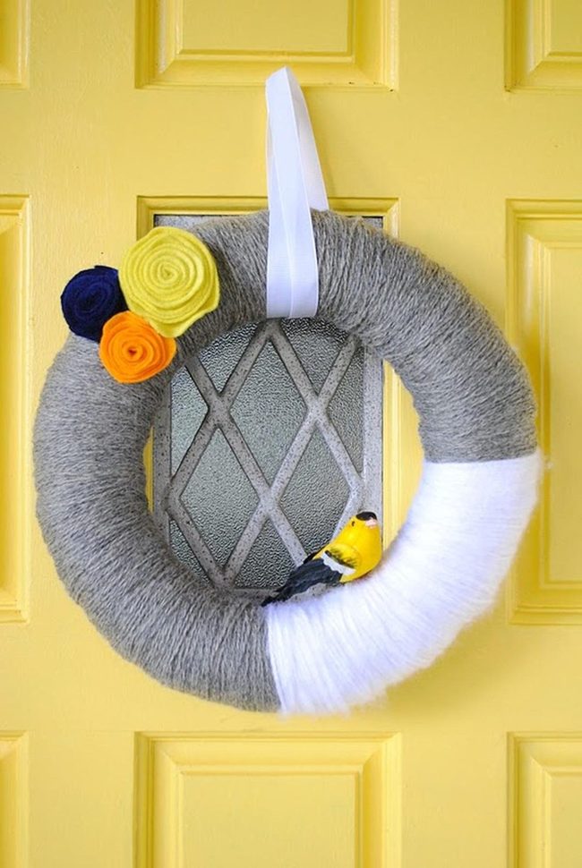 Bright Yellow Door With Handmade Yarn Wreath
