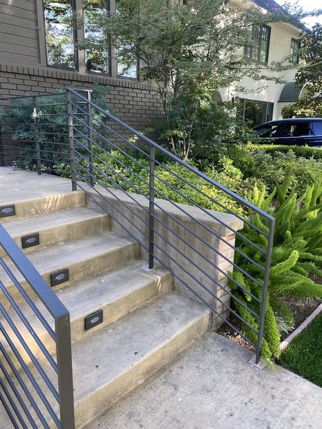 Illuminated Concrete Steps With Living Green
