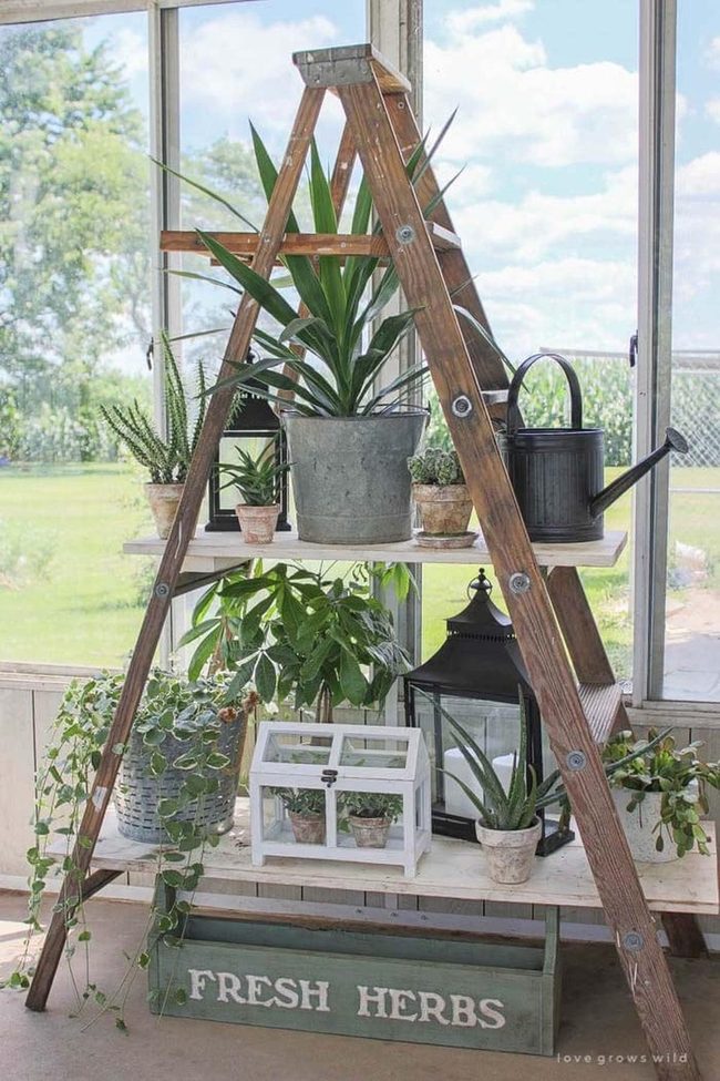 Stacked Greenery On Vintage Ladders