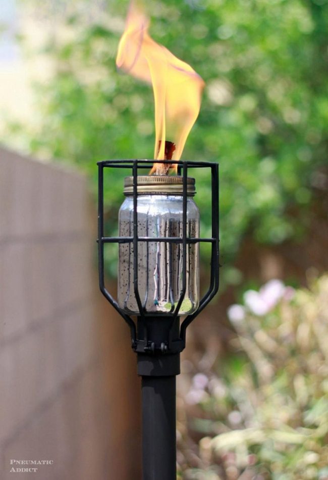 Black Metal Garden Torches Glimmering