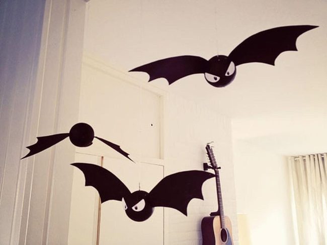 Three Black Ceiling Bats