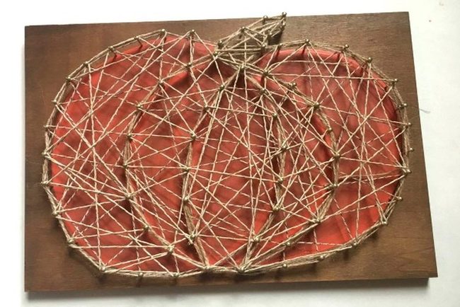 Orange Pumpkins On Wooden String