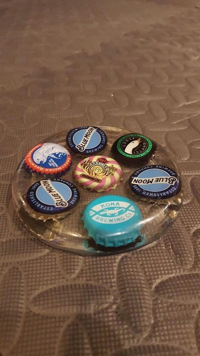 Colorful Bottle Caps Under Glass