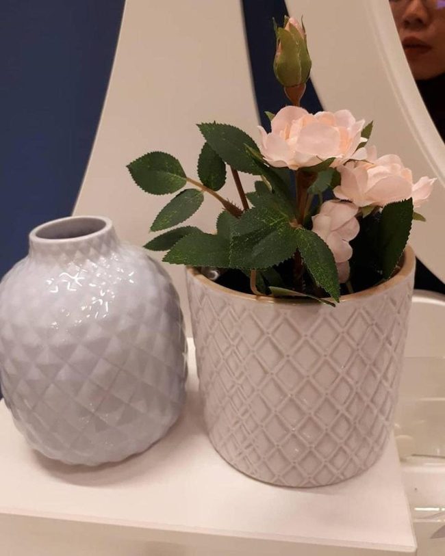 White Ceramic Pots With Geometric Patterns