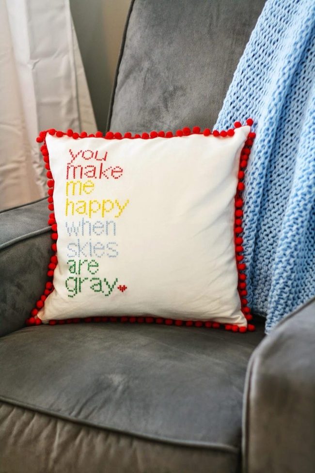 Gray Armchairs With Cheerful Red Pom-Poms